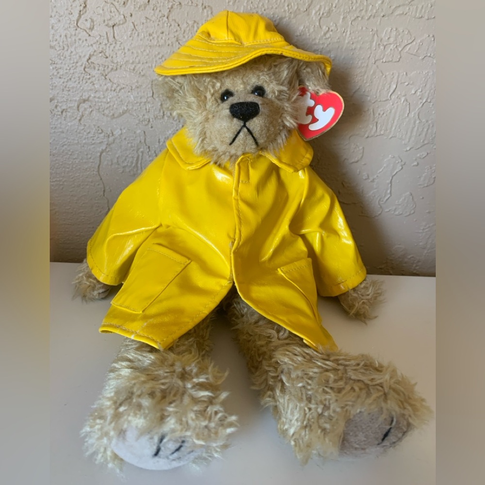 Vintage TY Collectible Teddy Bear wearing a raincoat and hat
